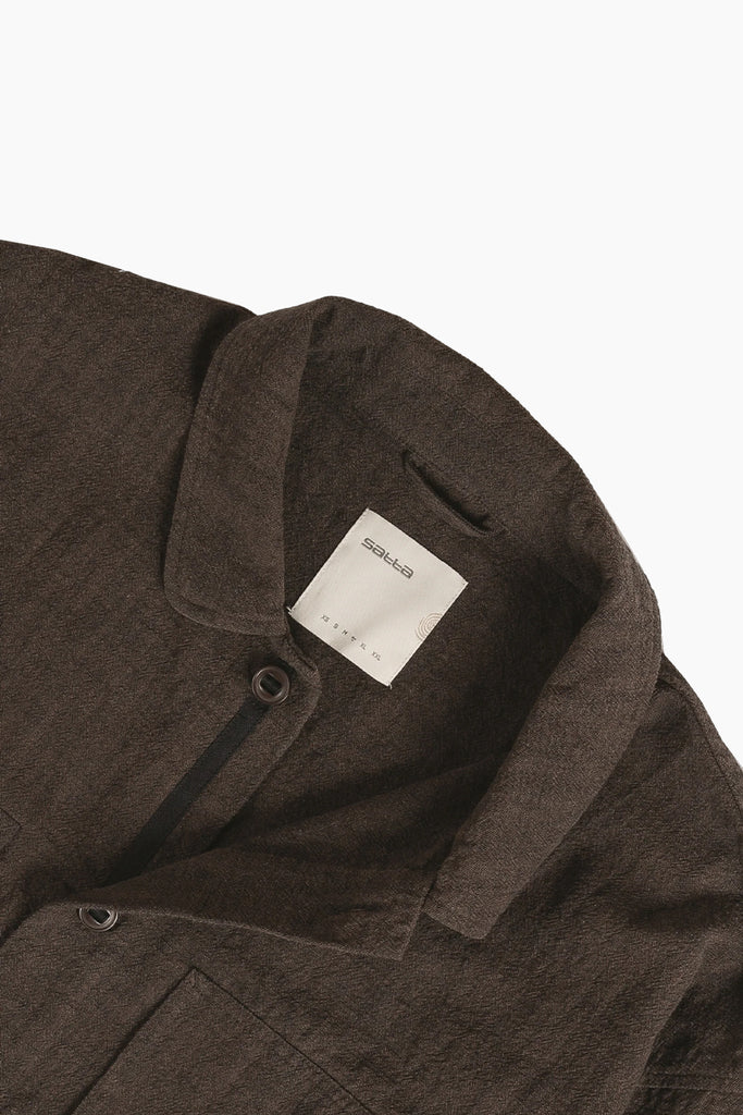 satta judo shirt detail photo showing button details and rounded color.