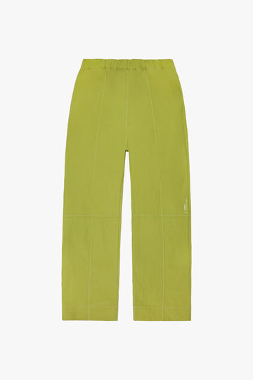 front image of a bright, yet muted green contrast stitched in white nylon pants from afield out