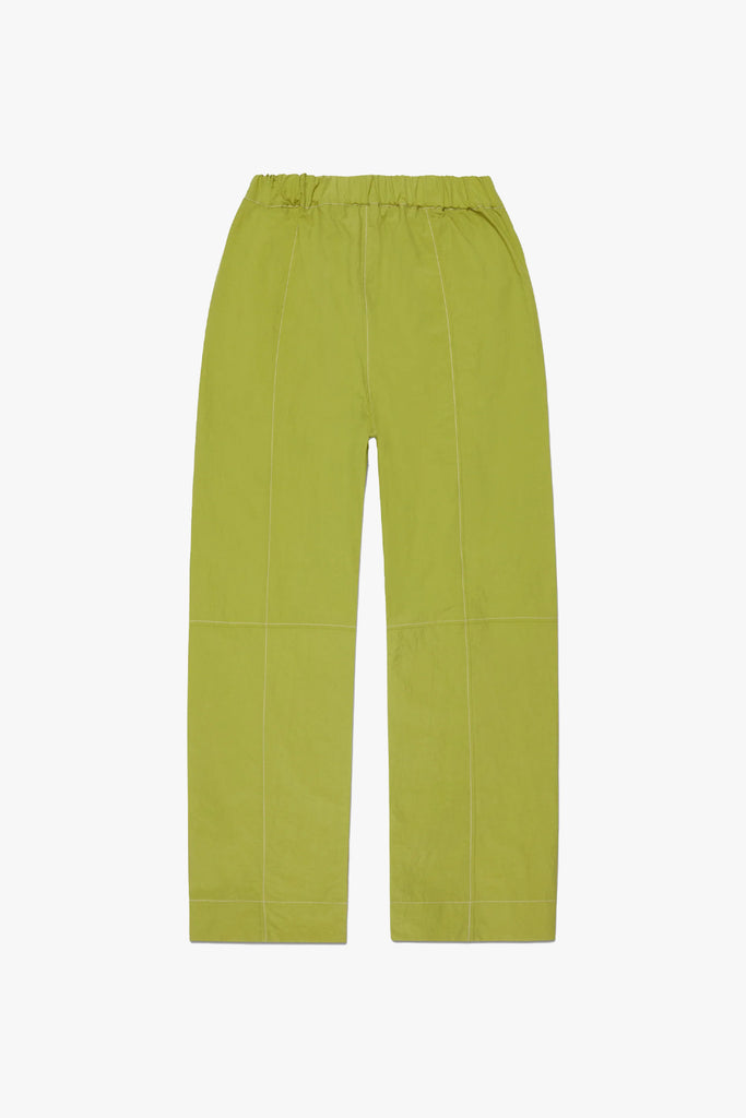 front image of a bright, yet muted green contrast back in white nylon pants from afield out