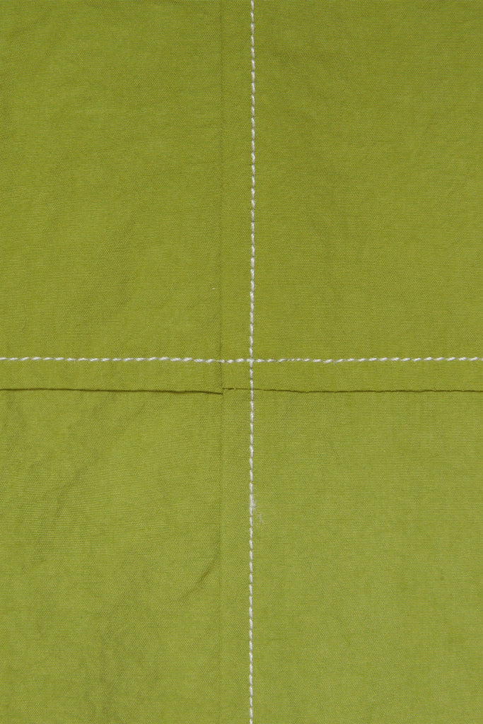 detail image of contrast stitch on green fabric for Afield Out Citron Pants