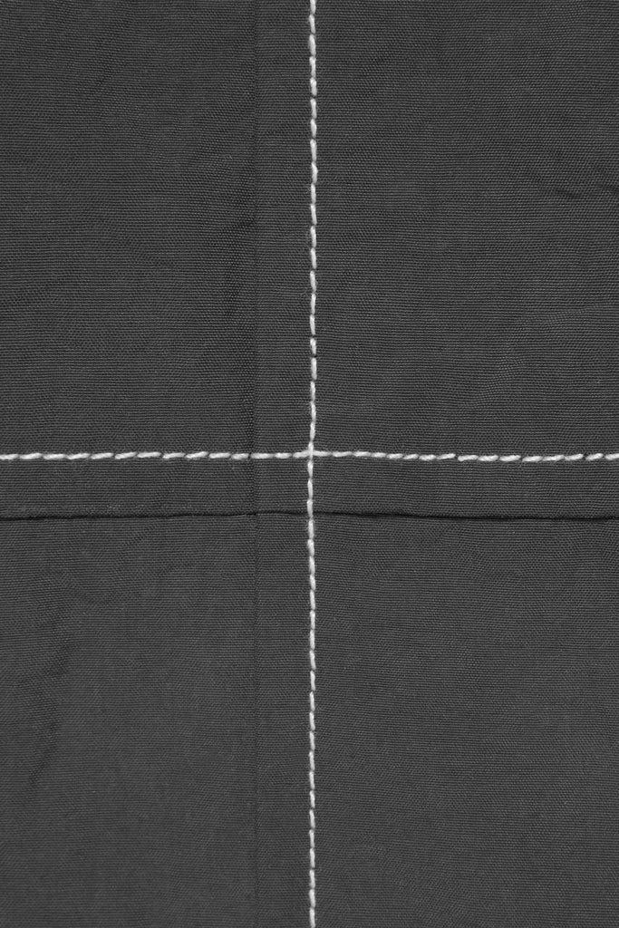 detail of the contrast stitch on charcoal fabric from Afield Out